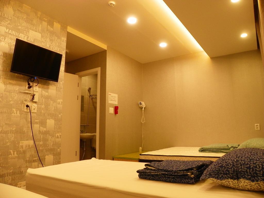 Feliz Casa Hotel Сеул Стая снимка